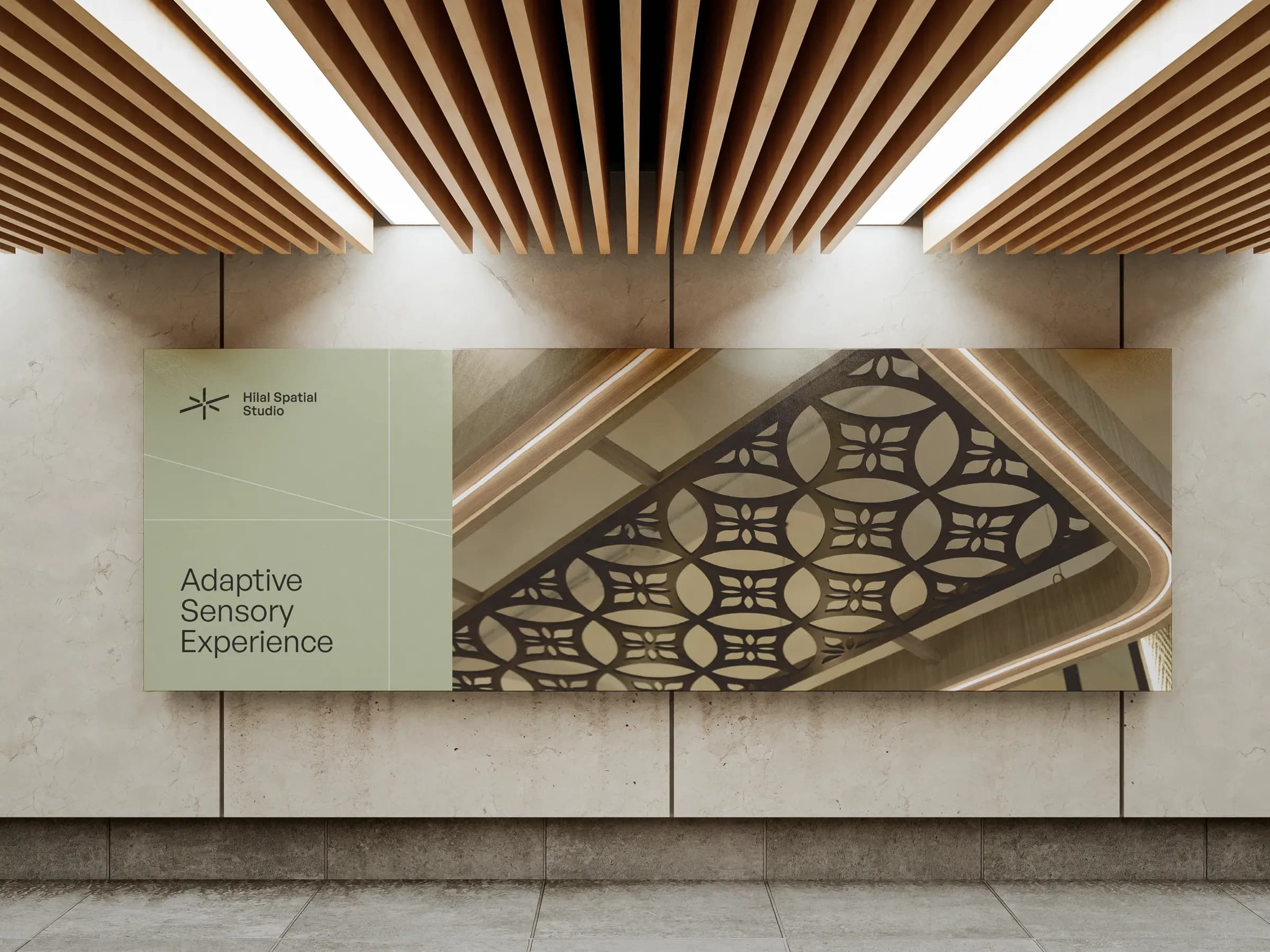 Hilal Spatial Studio sign reading Adaptive Sensory Experience, beside a carved ceiling panel